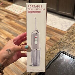 Portable Oral Irrigator